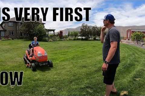 BEGINNER lawn mowing. Teaching a young boy