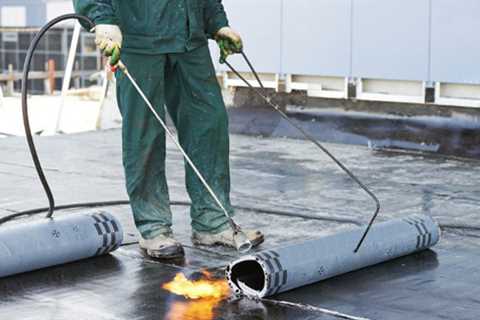Who Should I Call If I Have a Flat Roof Leaks?